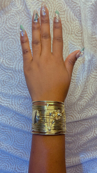 Bracelet manchette doré floral