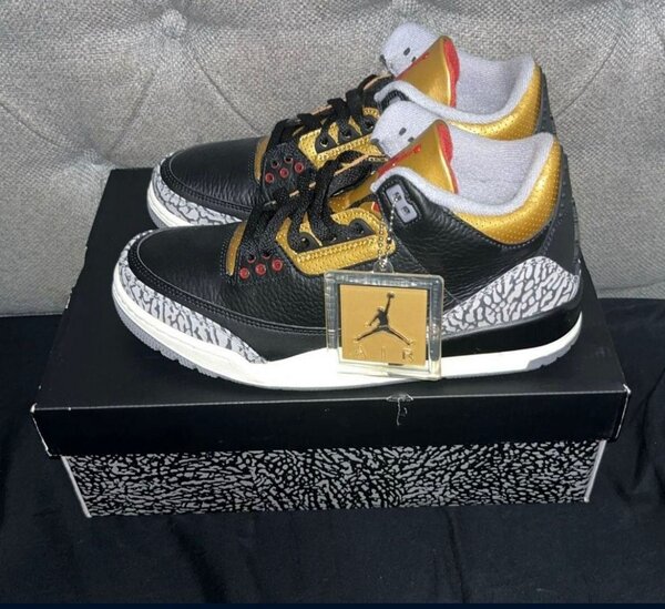 Sneakers en cuir noir et or