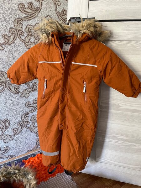 Зимние комбинезоны