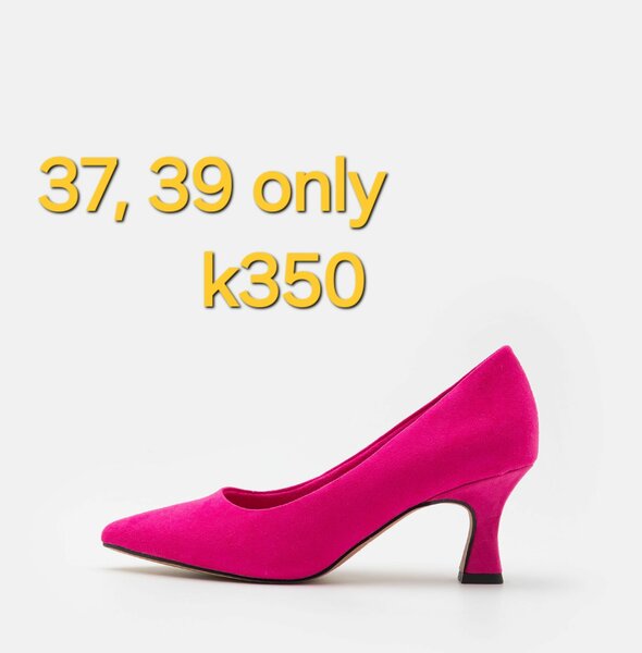 Pink pointed toe low heel shoes