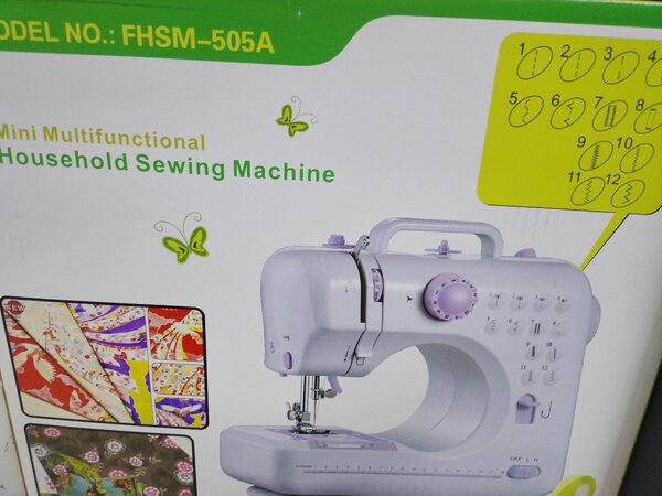 Mini machine à coudre multifonctionnelle