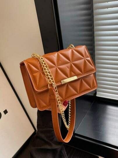 Sac à main en cuir marron doré