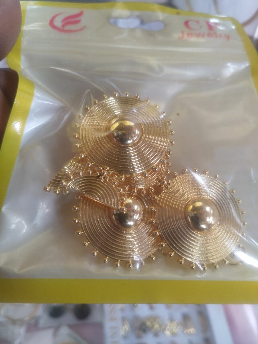 Boucles d'oreilles en spirale dorée