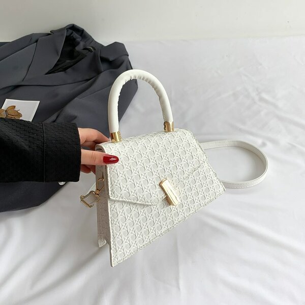 Stylish and fashionable women's assymetrical bag white