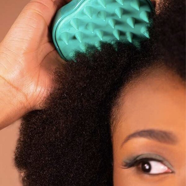 Brosse massante cuire chevelu