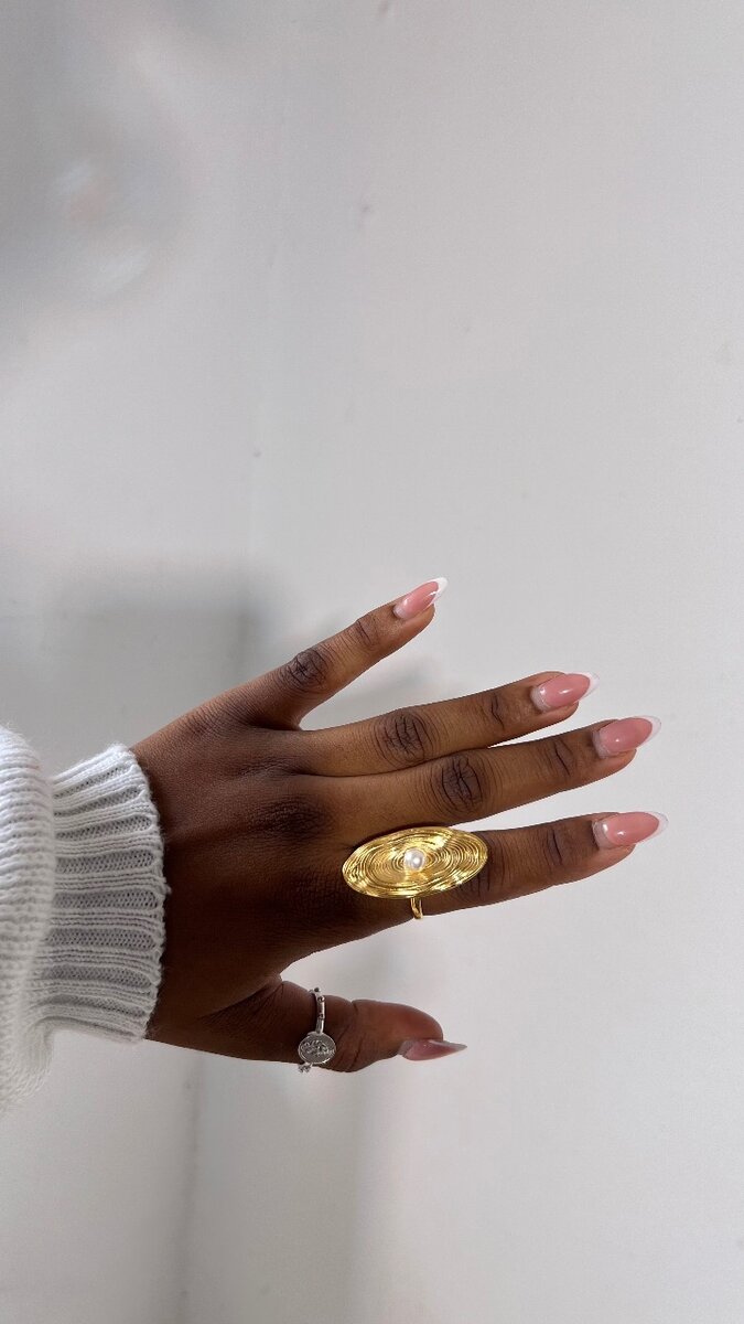 Bague dorée élégante perle