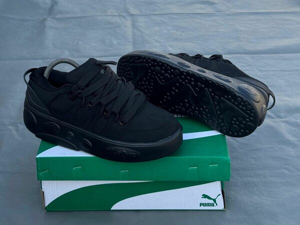 Baskets Puma noires élégantes