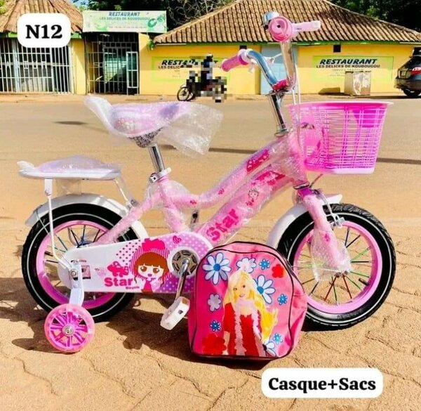 Vélo enfant rose avec accessoires