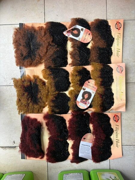 Perruque en cheveux synthétiques