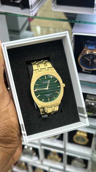 Montre Dorée Homme Élégante