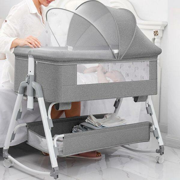 Lit bébé confortable avec moustiquaire