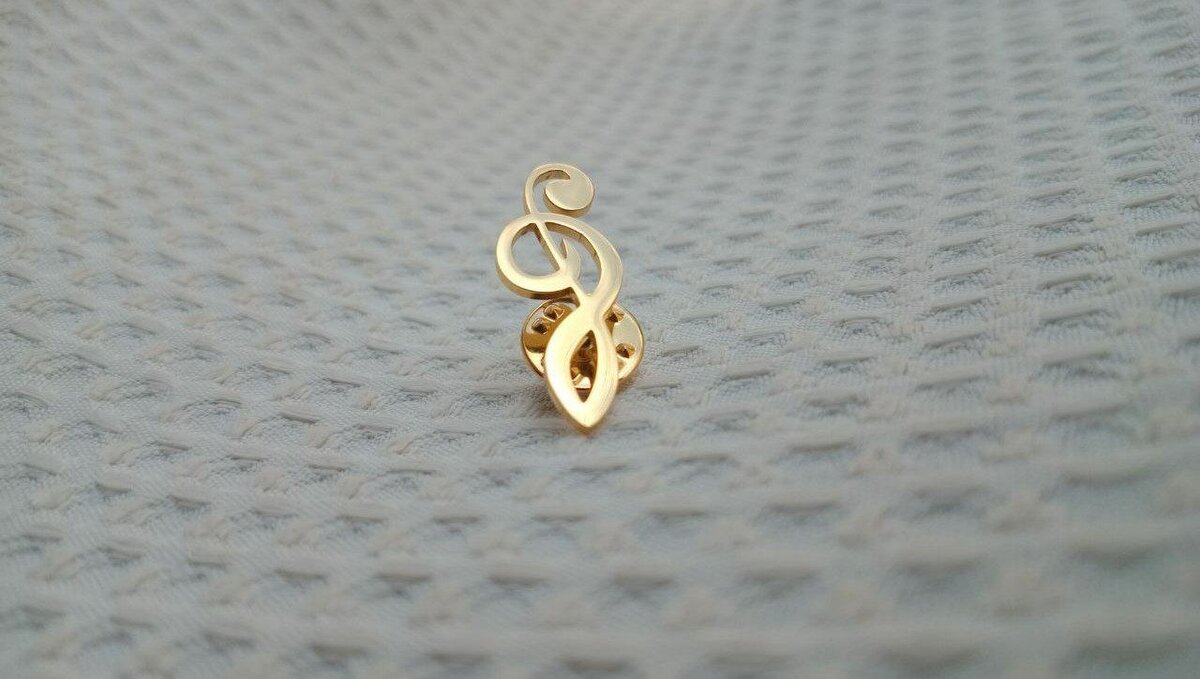 Musical symbol lapel pin