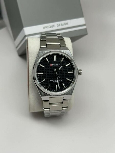 Montre analogique C U R R E N