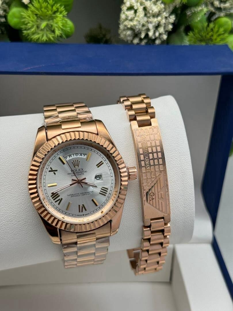 ROSE GOLD ROLEX CHAIN WATCH WITH BRACELET.