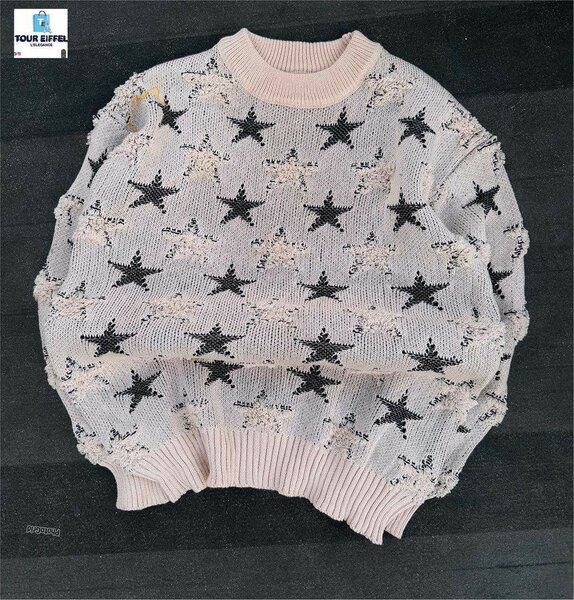 Pull en tricot étoilé