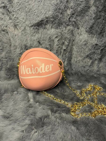 Sac à main ballon rose élégant