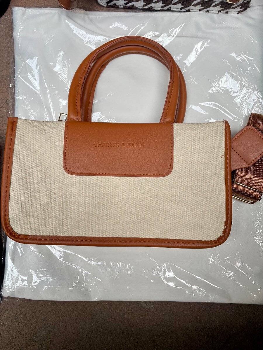 Sac élégant en cuir et toile