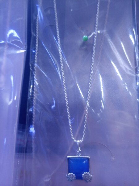 Silver necklace and locket