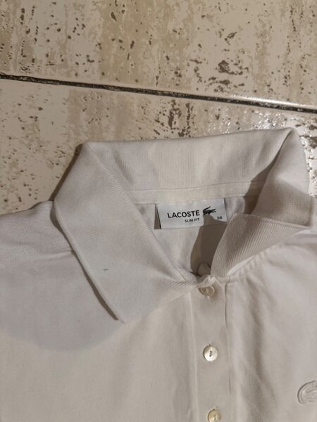 Polo blanc Lacoste femme