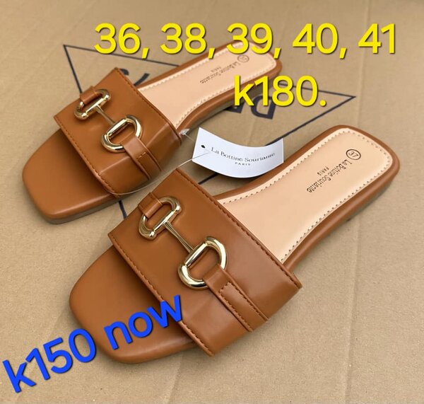 Brown patent leather flip-slops with gold hardware