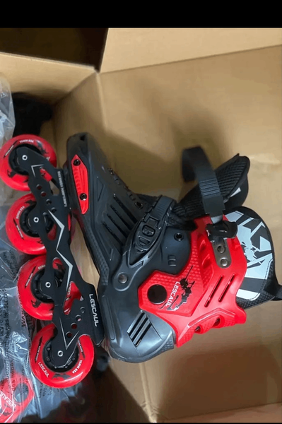 Patins à roulettes enfant rouge noir