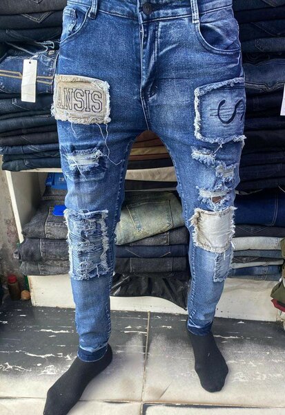 Jeans déchirés tendance homme