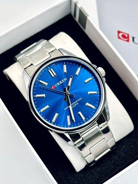 Curren acier fond bleu