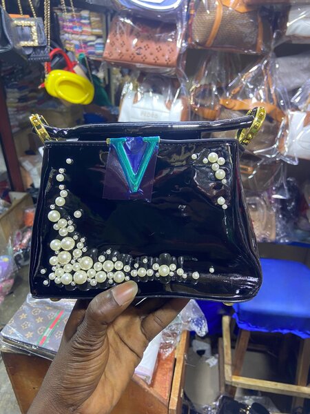 Sac à main élégant avec perles