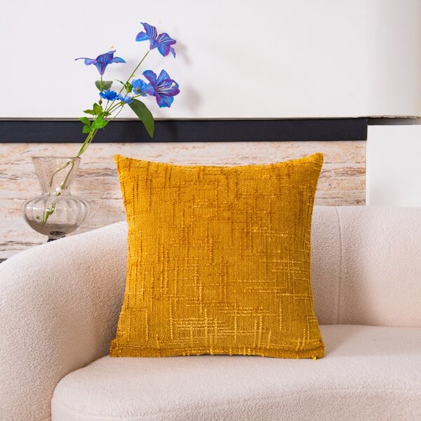 Coussin décoratif en velours doré