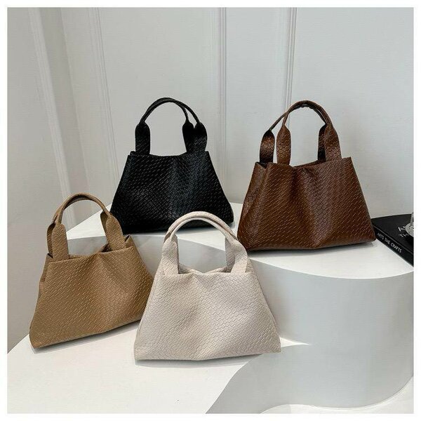 Sac à main tissé chic