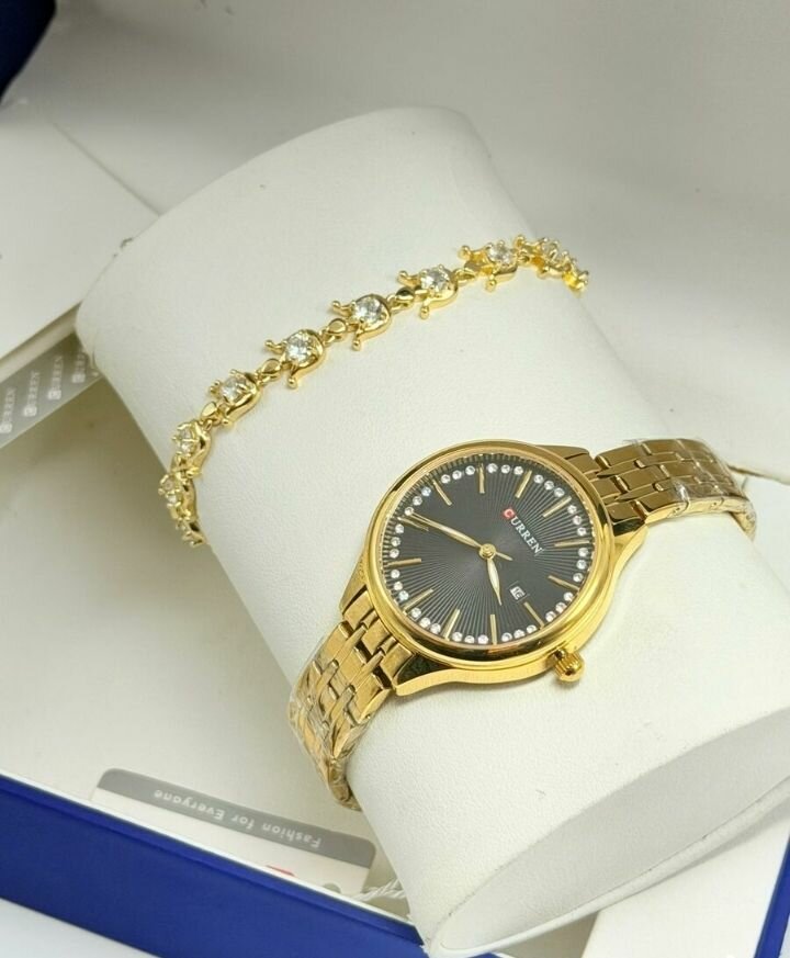 Montre CURREN en or avec bracelet