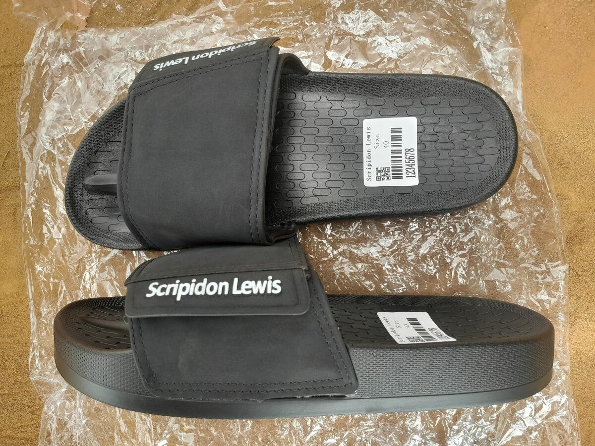 Claquettes noires unisexes