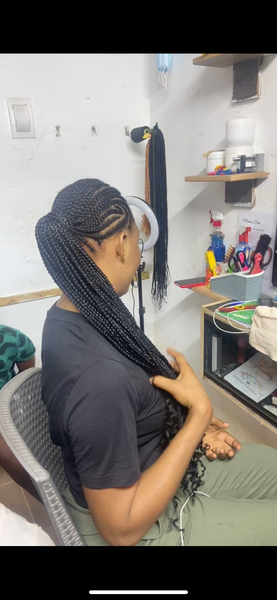 Perruque tressée afro élégante