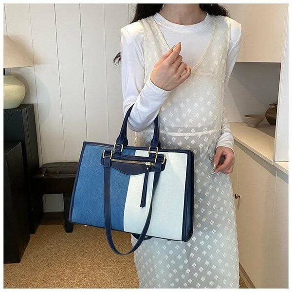 Sac à main élégant bicolore