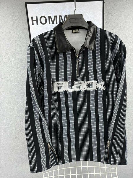 Pull rayé à col zippé