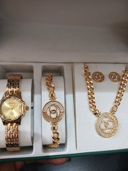Chanel jewelry set with Chanel watch