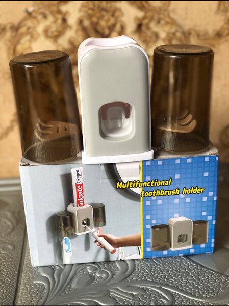 Toothbrush Holder with Automatic Toothpaste