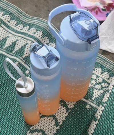 Gourde d'eau graduée en plastique