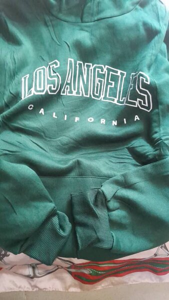 Sweat à capuche vert