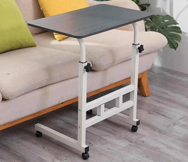 Adjustable table with storage