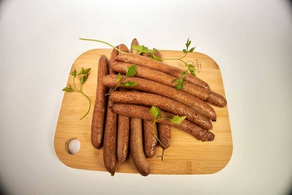 Fresh and grilled pork meat and sausages