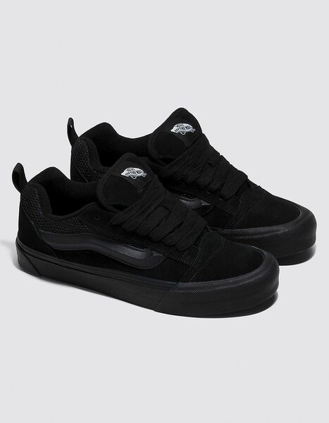 Baskets noires en cuir style skate