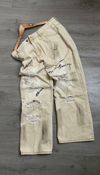 Jeans déchirés homme