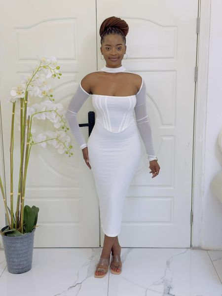 white long dress with corset and large neckline