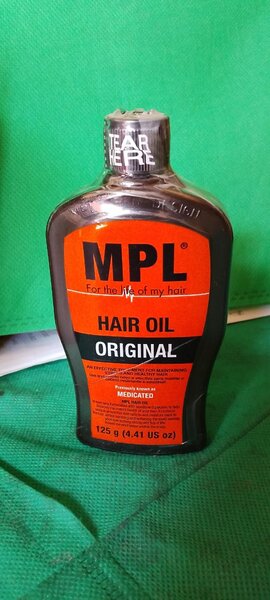 Minoxidile and hair oil