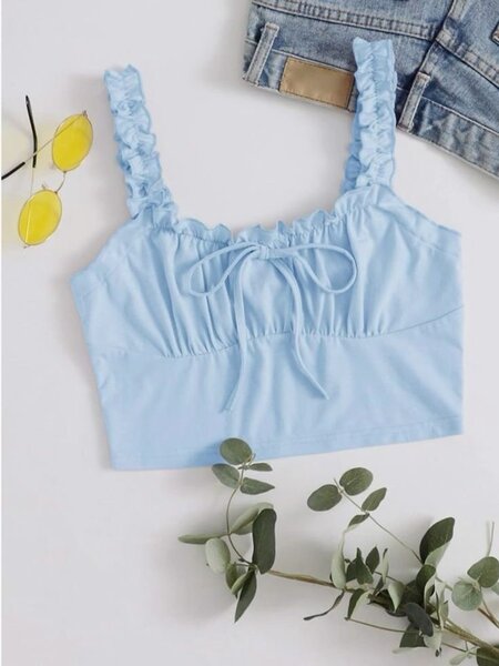 Top court bleu à bretelles