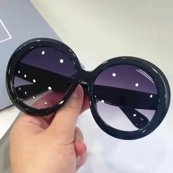 Lunettes de soleil rondes glamour