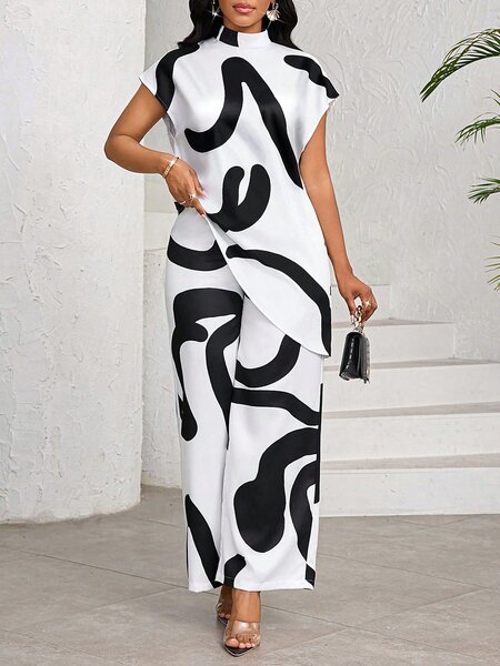 Combinaison longue noire et blanche élégante pour femme