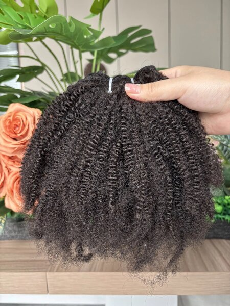 Extensions cheveux bouclés naturels