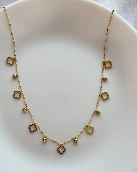 Collier doré pendentifs trèfle